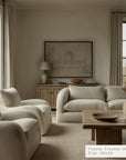 living room with beige sofa, armchairs, and wooden coffee table.