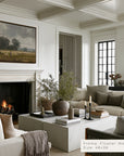cozy living room with fireplace, sofa, and decorative elements.