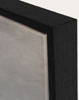 close-up of a black framed gray background.