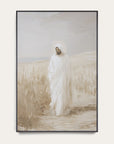 framed artwork of a person in a white robe standing in a field with a neutral background