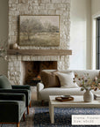 living room with stone fireplace, gray sofa, and coffee table with decor items.