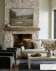 living room with stone fireplace, white sofa, and decorative elements.