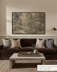 living room with brown sofa, marble coffee table, and framed artwork on the wall.