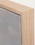 close-up of a wooden frame with a gray textured surface inside