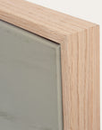 close-up of a wooden frame corner with a neutral background