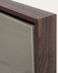 close-up of a wooden frame corner with a neutral background
