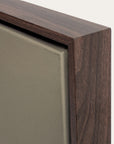 close-up of a wooden frame corner on a neutral background