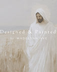 person in a white robe standing in a field with 'designed & painted by madelynn ave' text overlay.