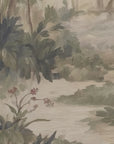 nature-themed wallpaper with green foliage and a river