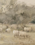 sheep grazing in a misty landscape with trees