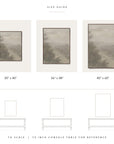 size guide showing the vertical forgotten road print framed in three sizes, labeled 30" x 40", 36" x 48", and 40" x 60", drawn to scale, with each size outlined above a 79-inch console table for reference.