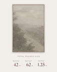 forgotten road in a light oak floater frame with its total framed size listed below: 42 inches wide, 62 inches high, and 1.25 inches deep.