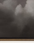 close-up of a textured surface with a signature at the bottom right corner.
