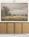 wooden sideboard with wicker doors and a framed landscape painting above it, showing dimensions.