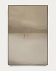 framed artwork of a person standing in a vast, misty landscape with a neutral color palette.