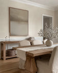 dining room with wooden table, chairs, and decorative elements.