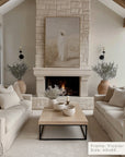 modern living room with a fireplace, beige sofas, and decorative elements.