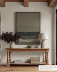 living room with wooden console table, framed artwork, and decorative items. __lifestyleimage