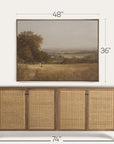 wooden sideboard with wicker doors and a framed landscape painting above it, showing dimensions.