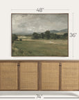 wooden sideboard with wicker doors and a framed landscape painting above it, with measurements indicated.