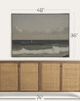 wooden sideboard with wicker doors and framed artwork above it on a white background