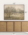 framed landscape painting above a wooden sideboard with dimensions indicated.