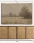framed landscape painting above a wooden sideboard with dimensions displayed.