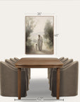 dining room setup with a wooden table and gray chairs, featuring a framed artwork above.