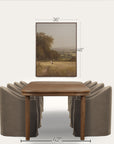 dining table with chairs and a framed landscape picture on a white background