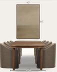 wooden table with dimensions labeled next to a mirror and chairs on a white background