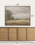 wooden sideboard with wicker doors and framed landscape painting above it, with dimensions indicated.