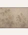 a framed wall art print featuring a soft, muted landscape of trees in sepia and beige tones, displayed against a light off-white wall.