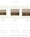 size guide showing white mountains framed in three sizes, labeled 30" x 40", 36" x 48", and 40" x 60", drawn to scale, with each size outlined above a 79-inch console table for reference.