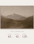 white mountains in a light oak floater frame with its total framed size listed below: 62 inches wide, 42 inches high, and 1.25 inches deep.