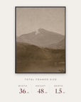 white mountains in a black floater frame with its total framed size listed below: 36 inches wide, 48 inches high, and 1.5 inches deep.