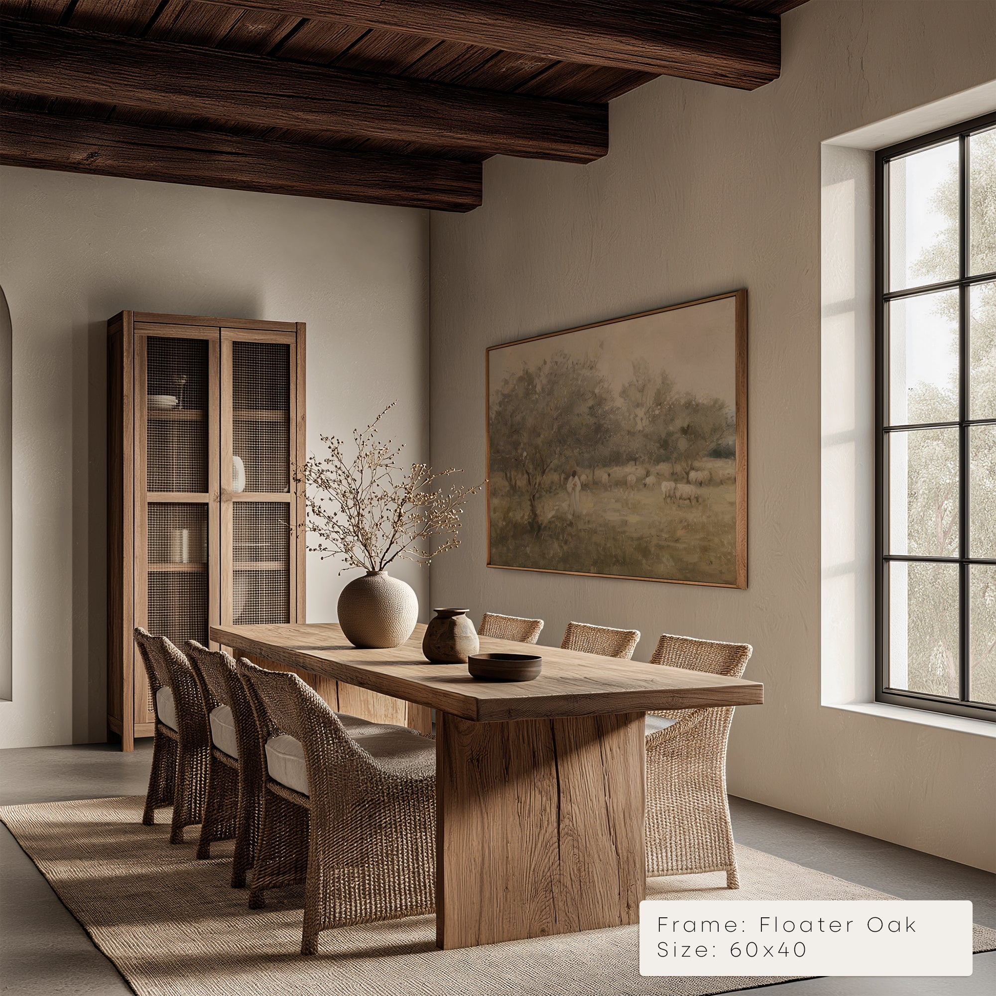 Dining room with wooden table and chairs, framed artwork on the wall.