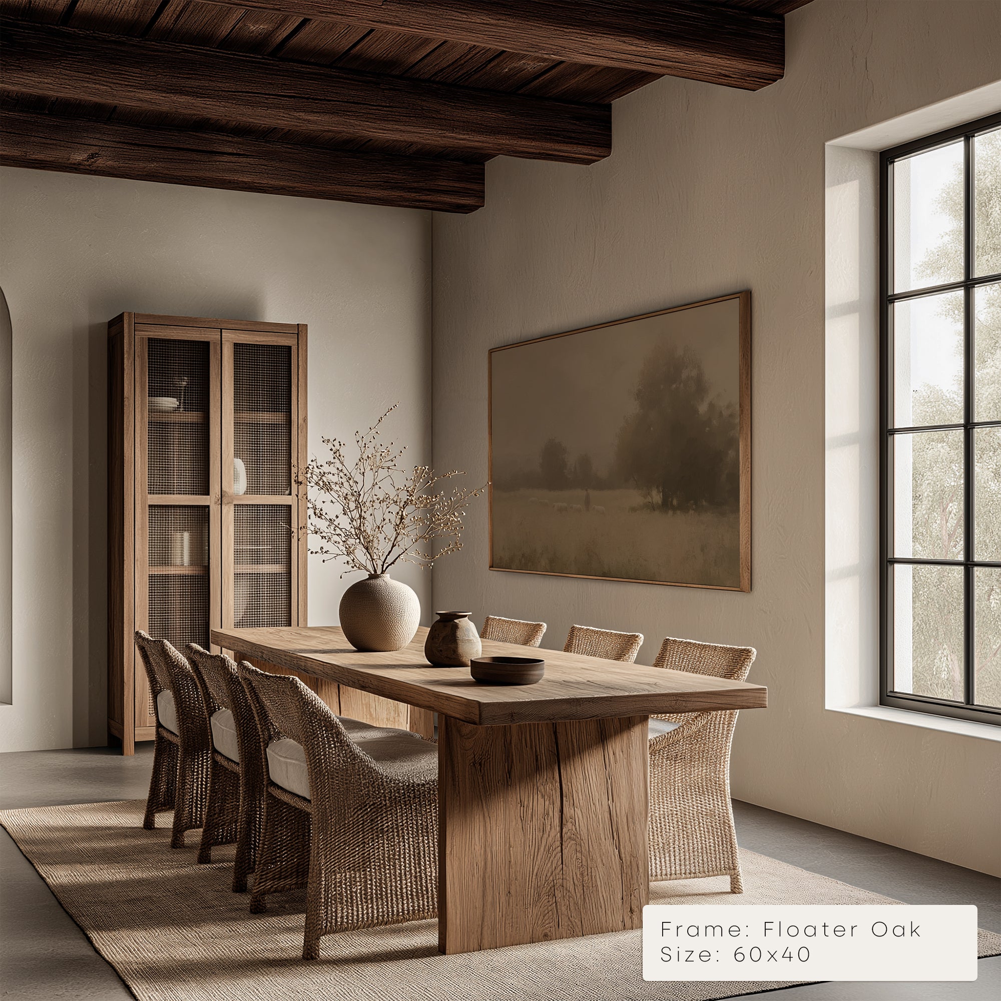 Dining room with wooden table and chairs, framed artwork on the wall.