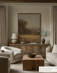 living room with neutral tones, furniture, and a large painting on the wall.