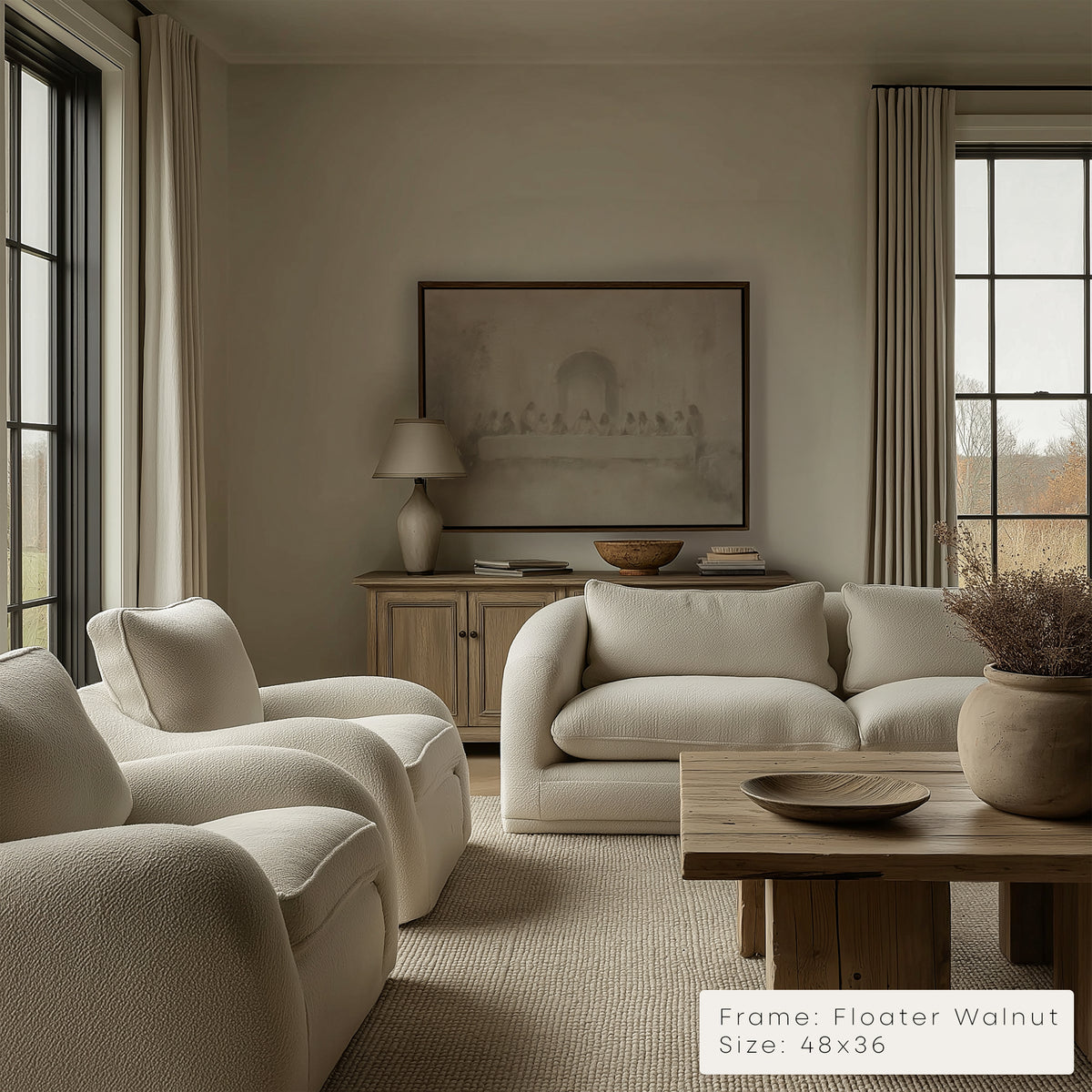 Living room with beige sofa, armchairs, and wooden coffee table.