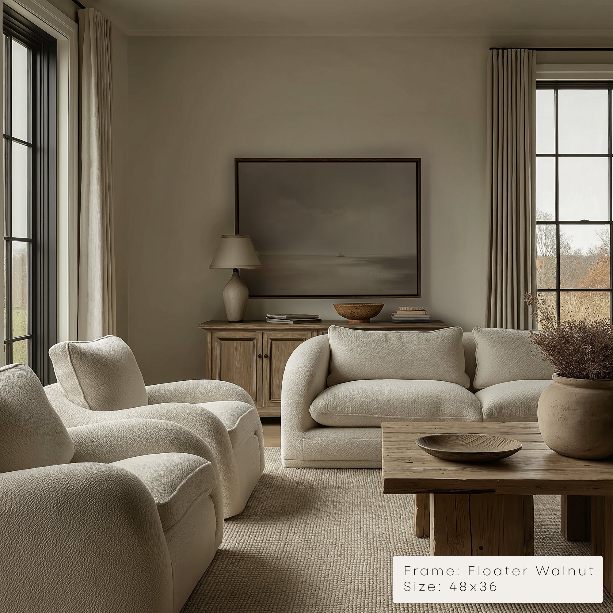 Modern living room with beige sofa, armchairs, and wooden coffee table.