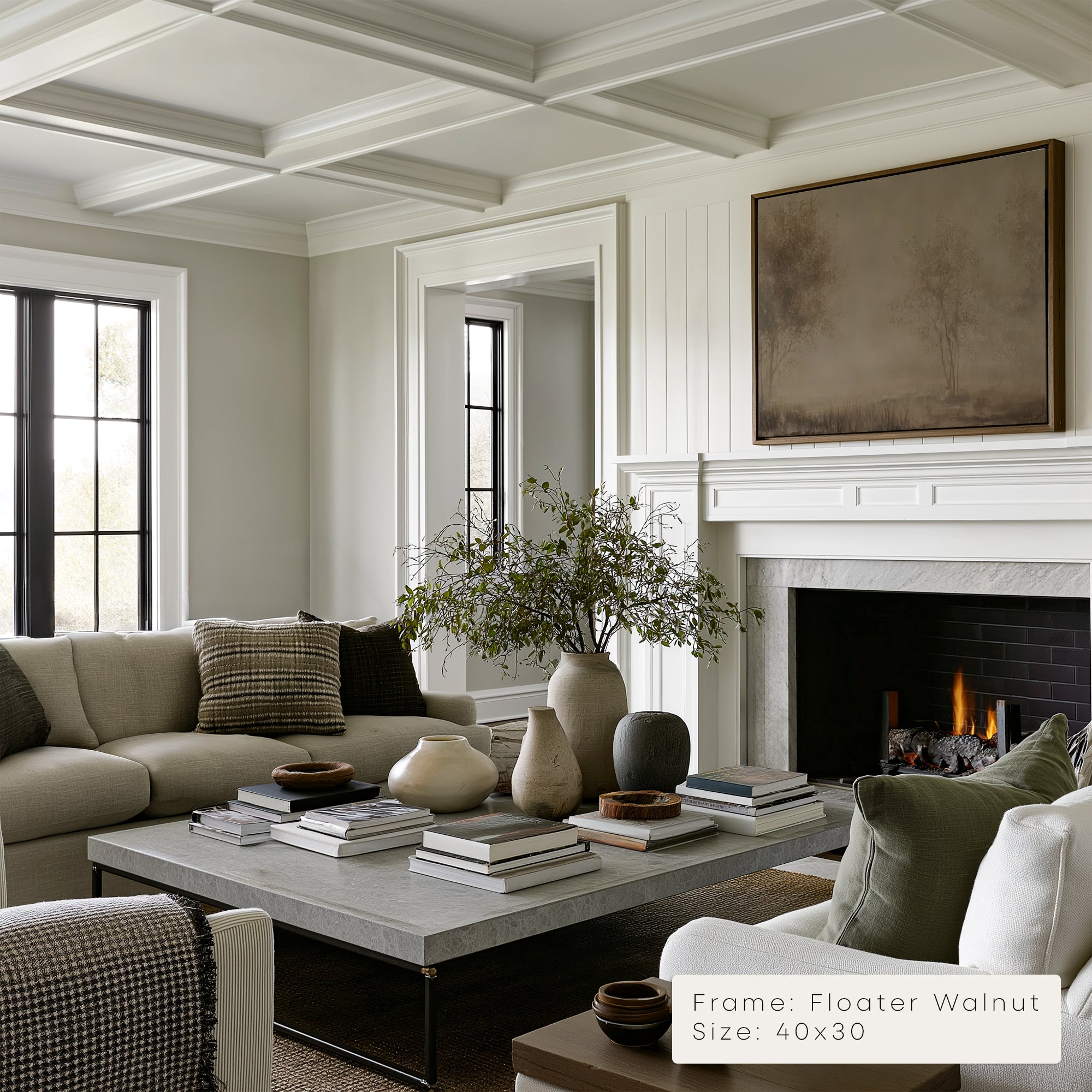 Living room with a fireplace, sofa, coffee table, and decorative items.