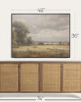 framed landscape painting above a wooden sideboard with dimensions indicated. 