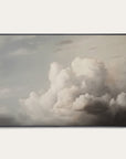 framed artwork of a dramatic cloud formation on a white wall 
