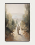 framed artwork of a person walking down a misty path in a forest 