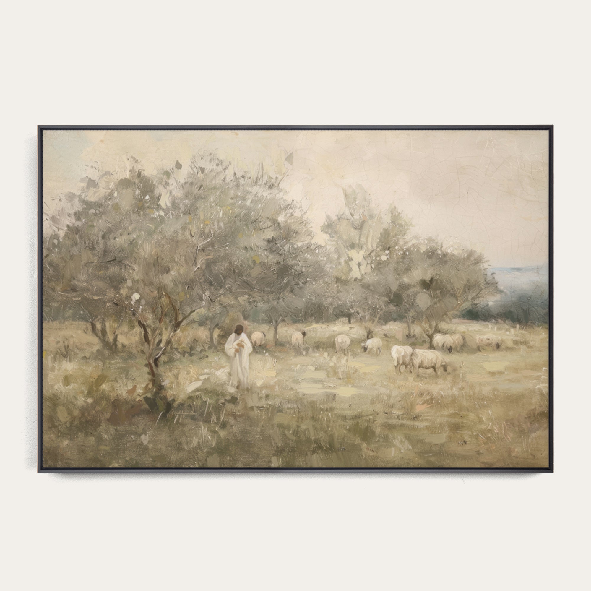 Framed artwork of a pastoral scene with a shepherd and sheep in a field. 