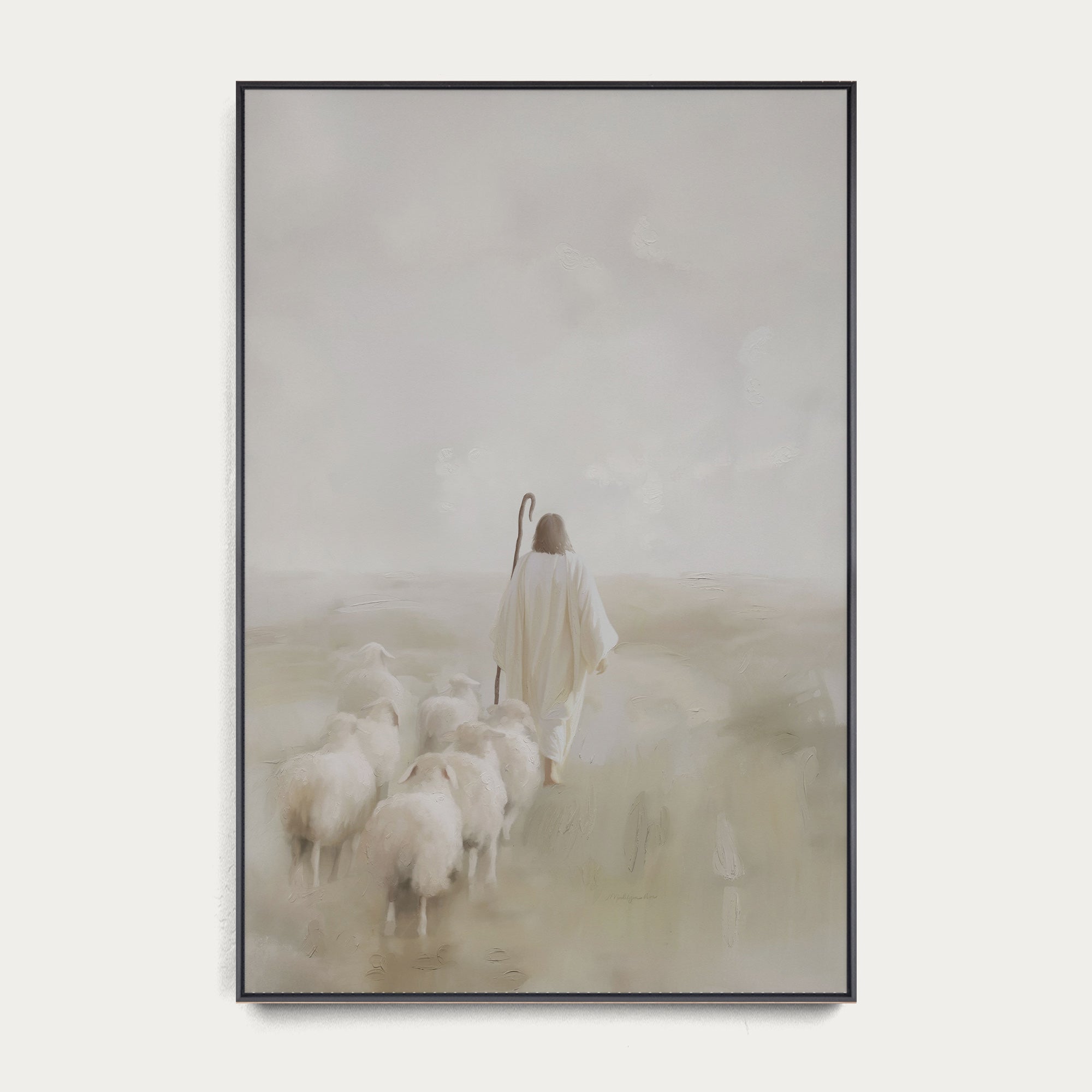 Framed artwork of a shepherd with sheep in a misty landscape 