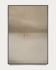 framed artwork of a minimal landscape with a person and dog in a vast, misty field. 