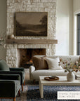 living room with stone fireplace, white sofa, and decorative elements.