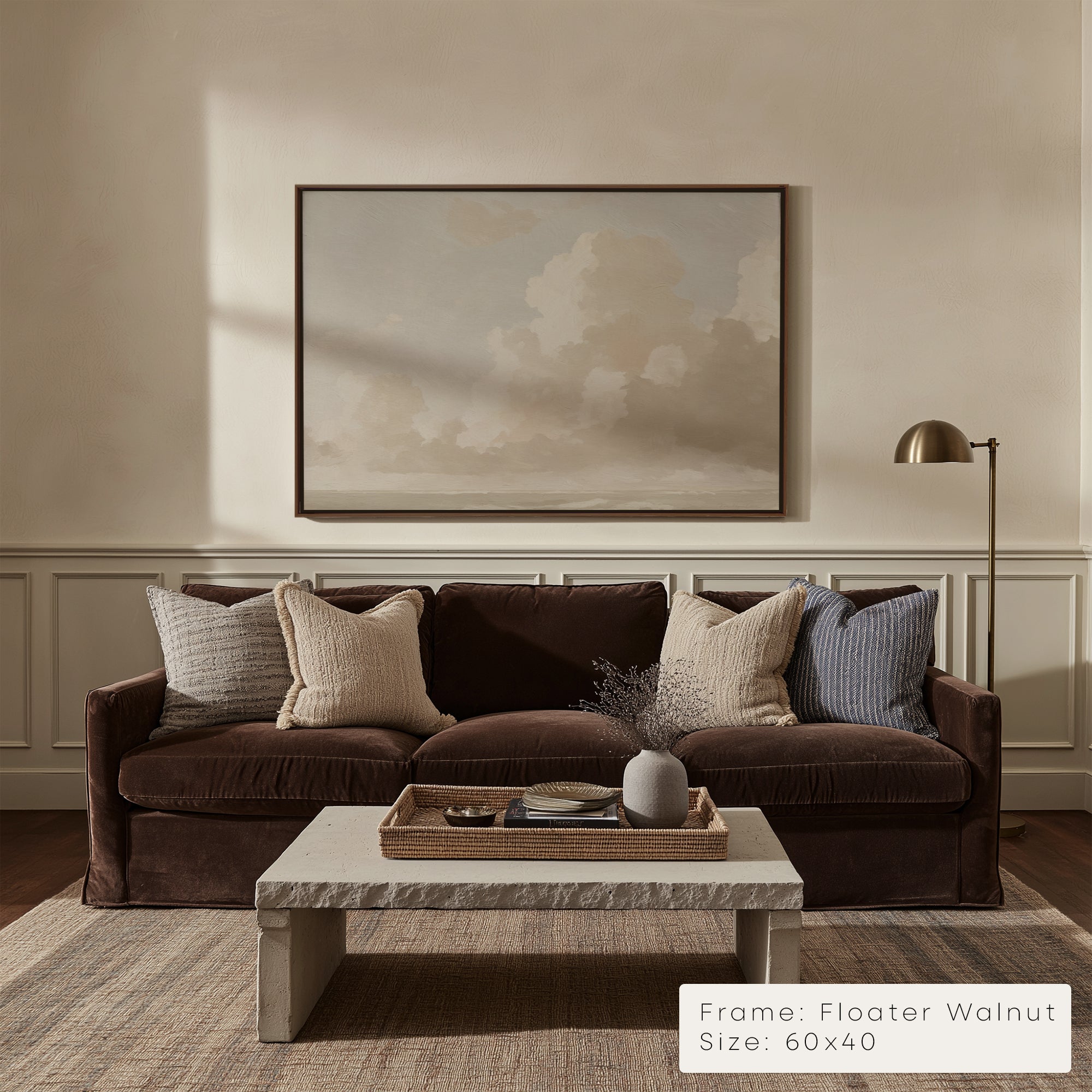 Living room with a brown sofa, marble coffee table, and framed artwork on the wall. __lifestyleImage