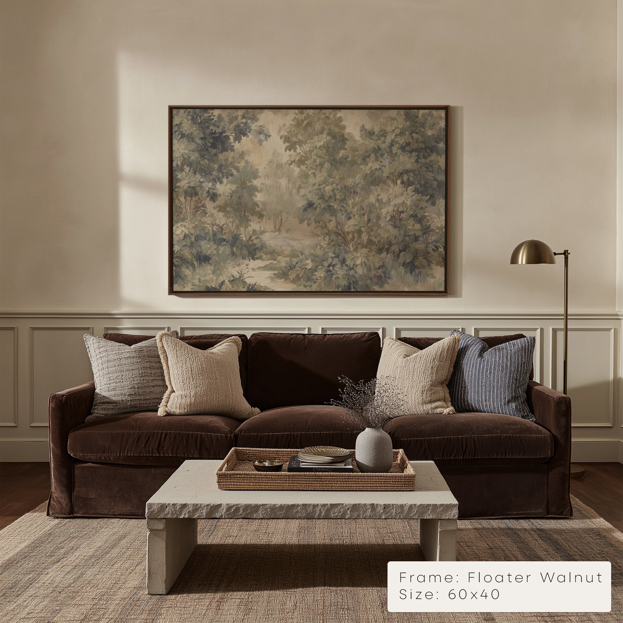 Living room with brown sofa, marble coffee table, and framed artwork on the wall.
